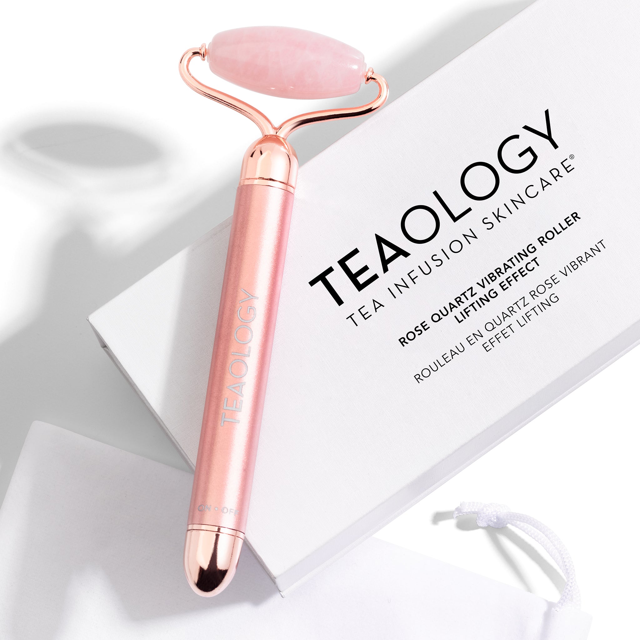 Vibrating Face Roller massaggiatore per il viso in quarzo rosa