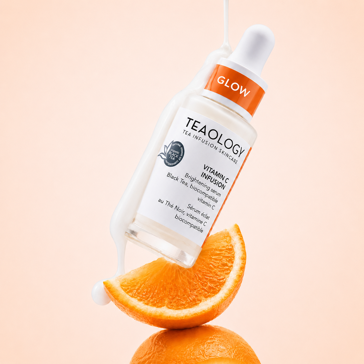 Siero alla vitamina C con uno spicchio d'arancia
